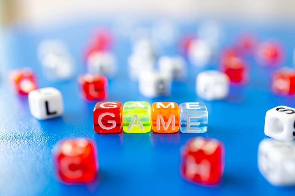 colorful plastic dice spells game