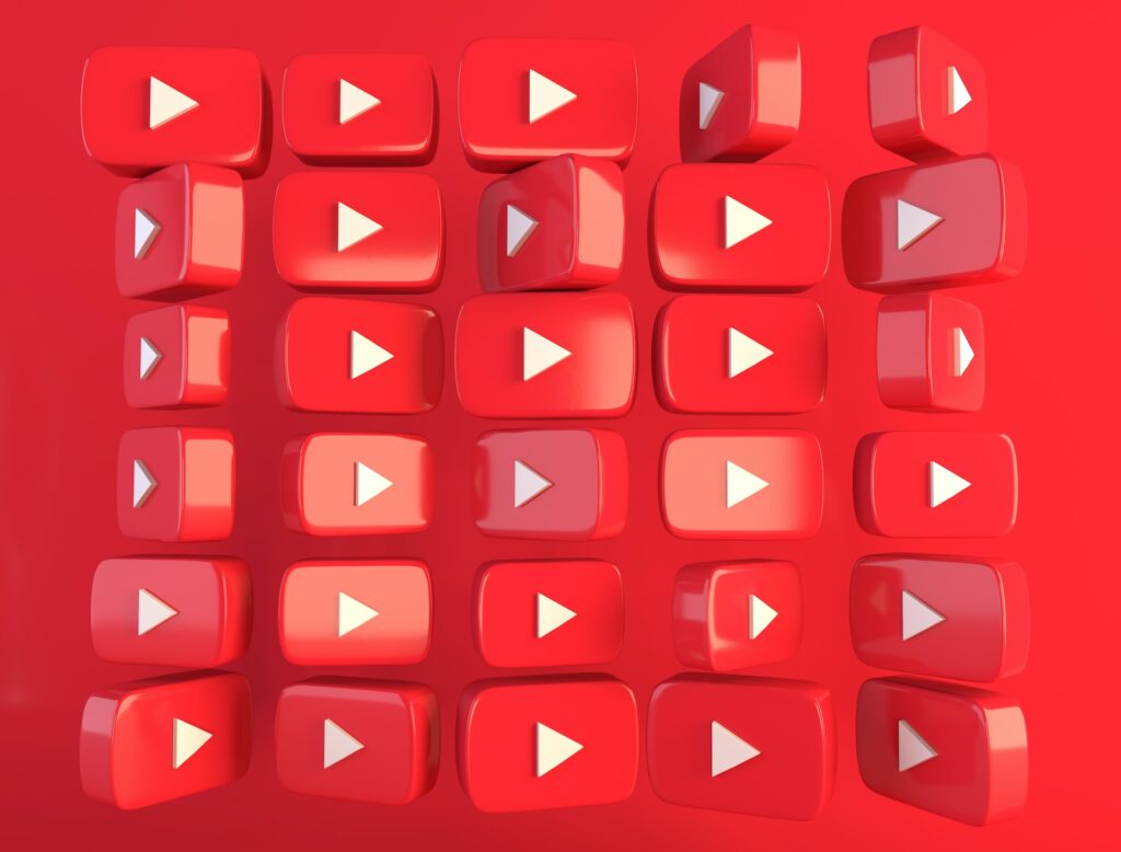 multiple youtube logos on red background