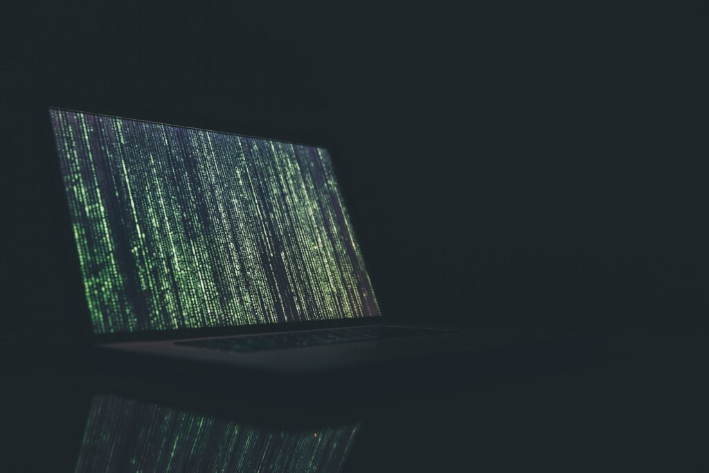 dark background with laptop encryption screen