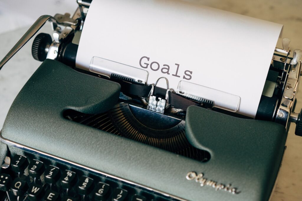 typewriter paper saying goals