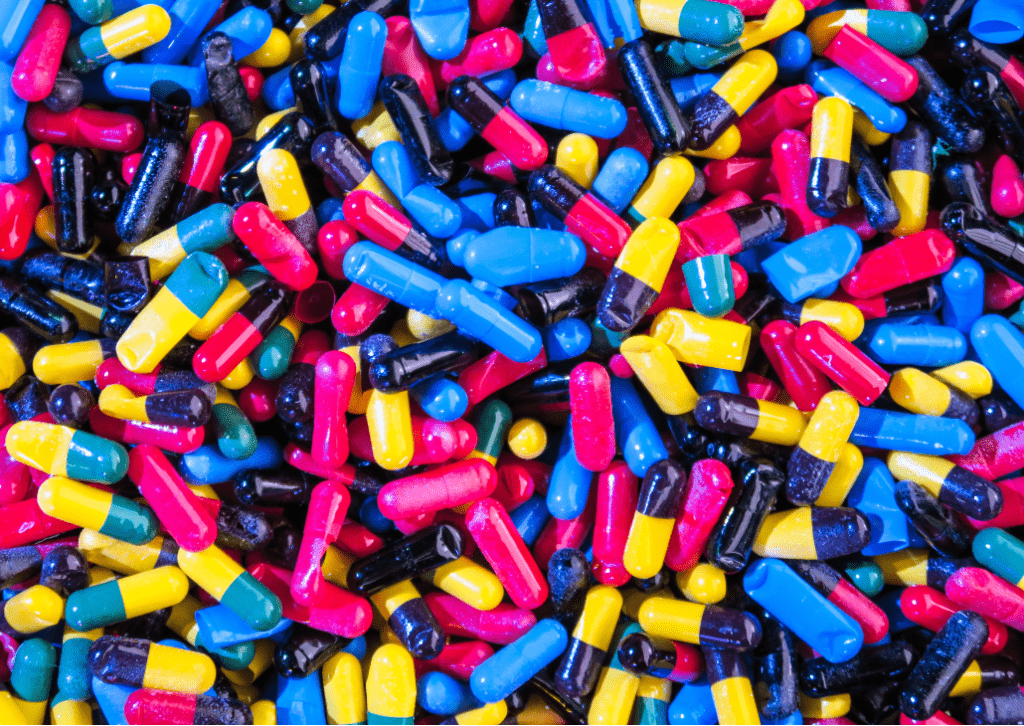 A pile of colorful prescription drugs.