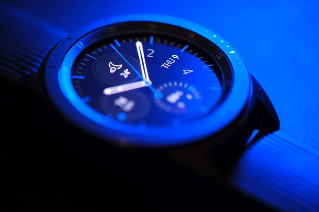 A blue smart watch.