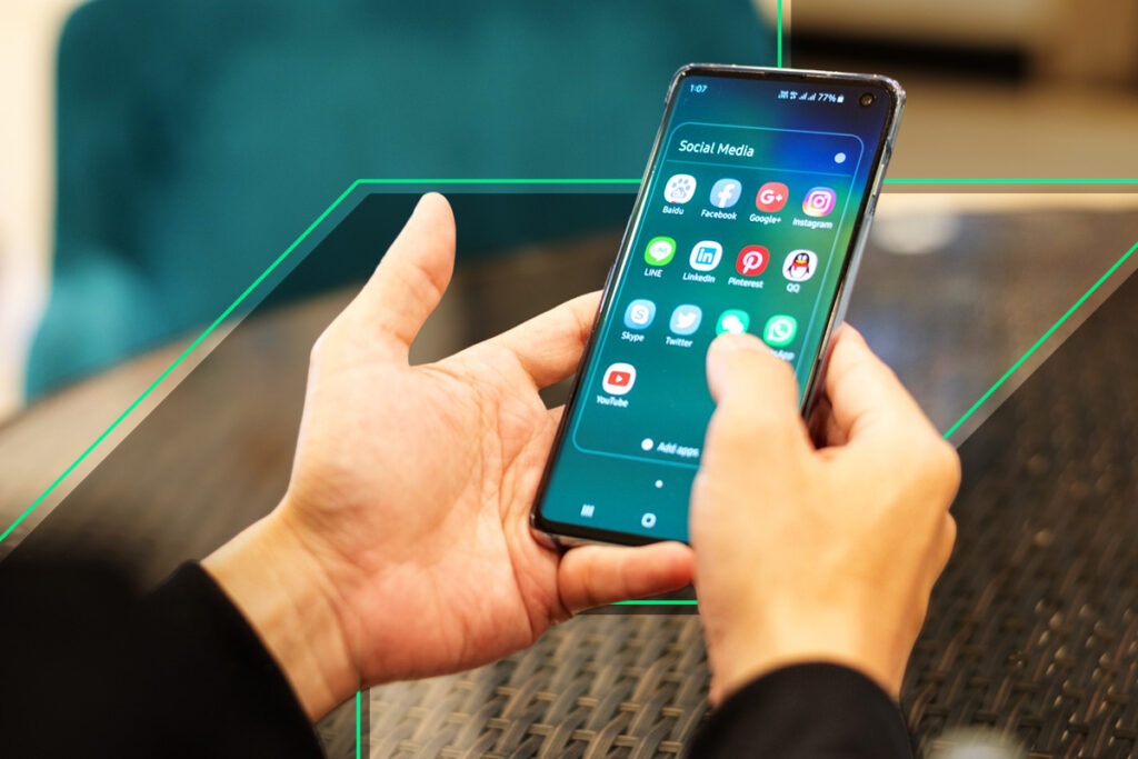 Someone holding a phone.