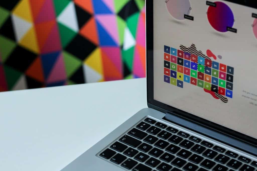 Laptop screen displaying many social media icons