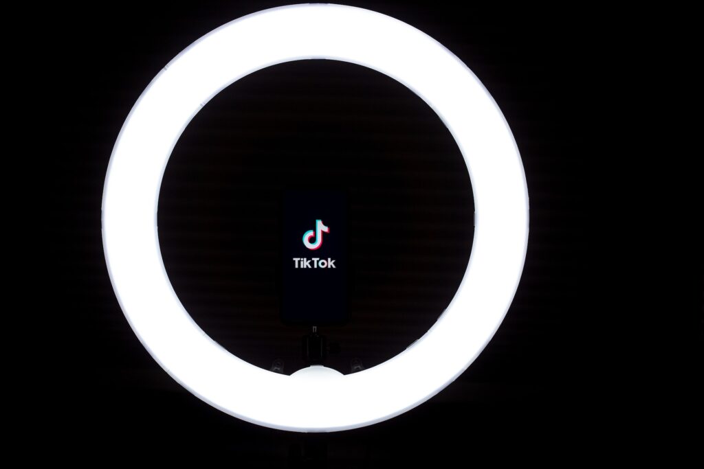 TikTok logo inside a ring light
