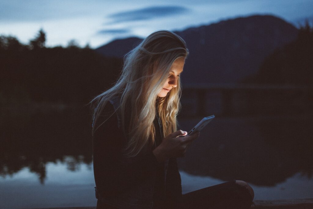 woman looking at phone