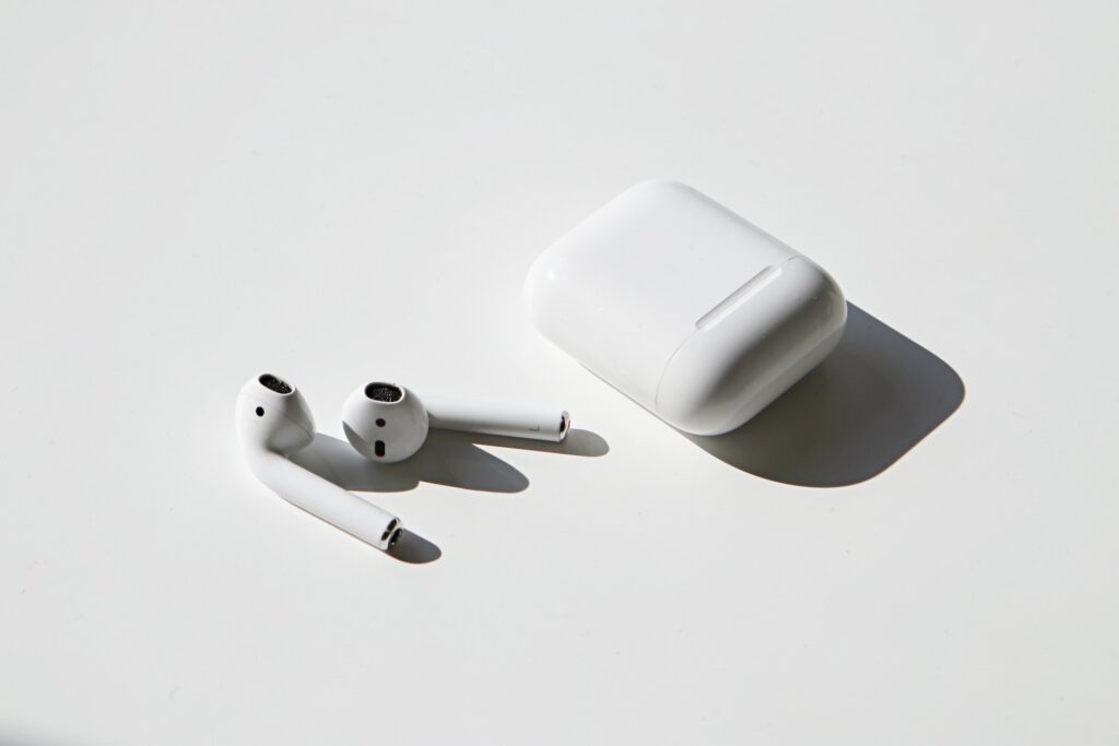 Apple AirPods with a white background