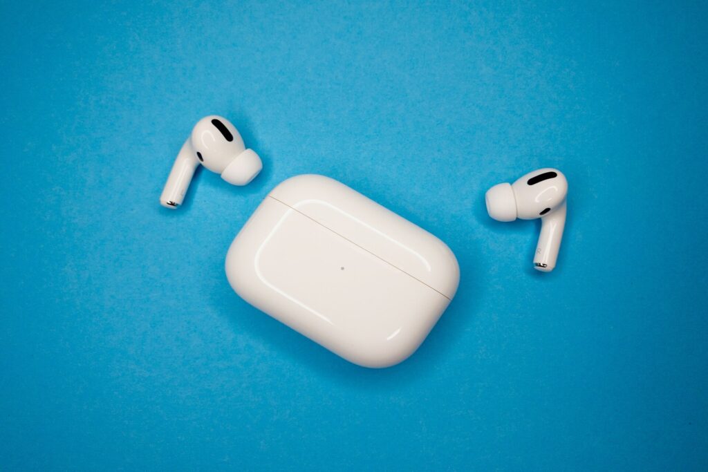 Apple AirPods Pro with a blue background