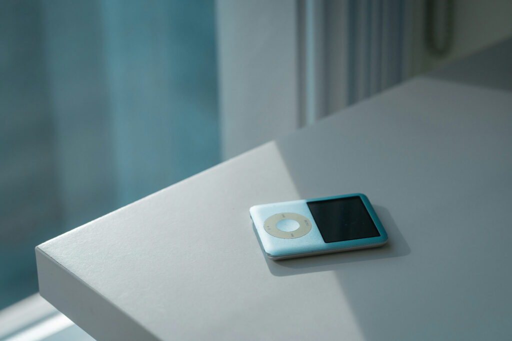 classic ipod on a white table