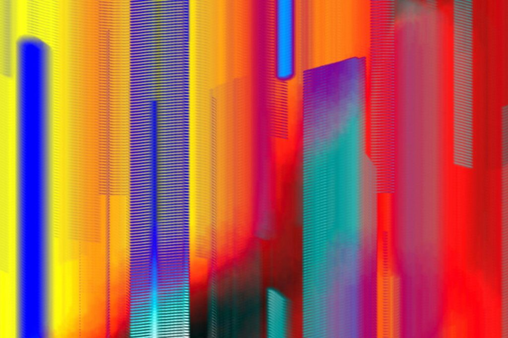 An abstract representation of a flickering screen with vertical streaks of bright, multicolored light.