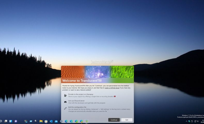 A transluscent taskbar with icons showing on a monitor.