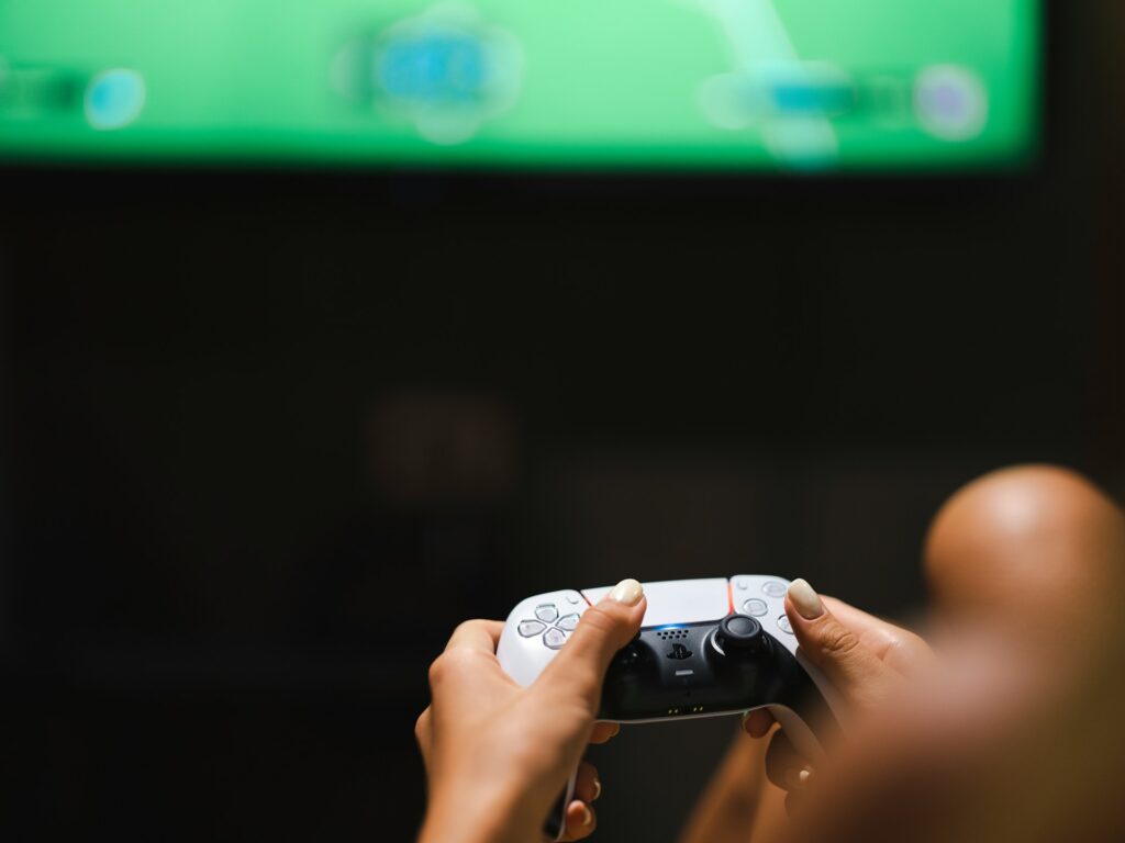 Someone holding a gaming controller.