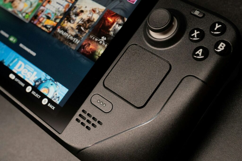 A black hand-held game console