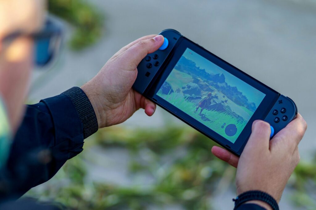 Man playing Zelda on Nintendo Switch