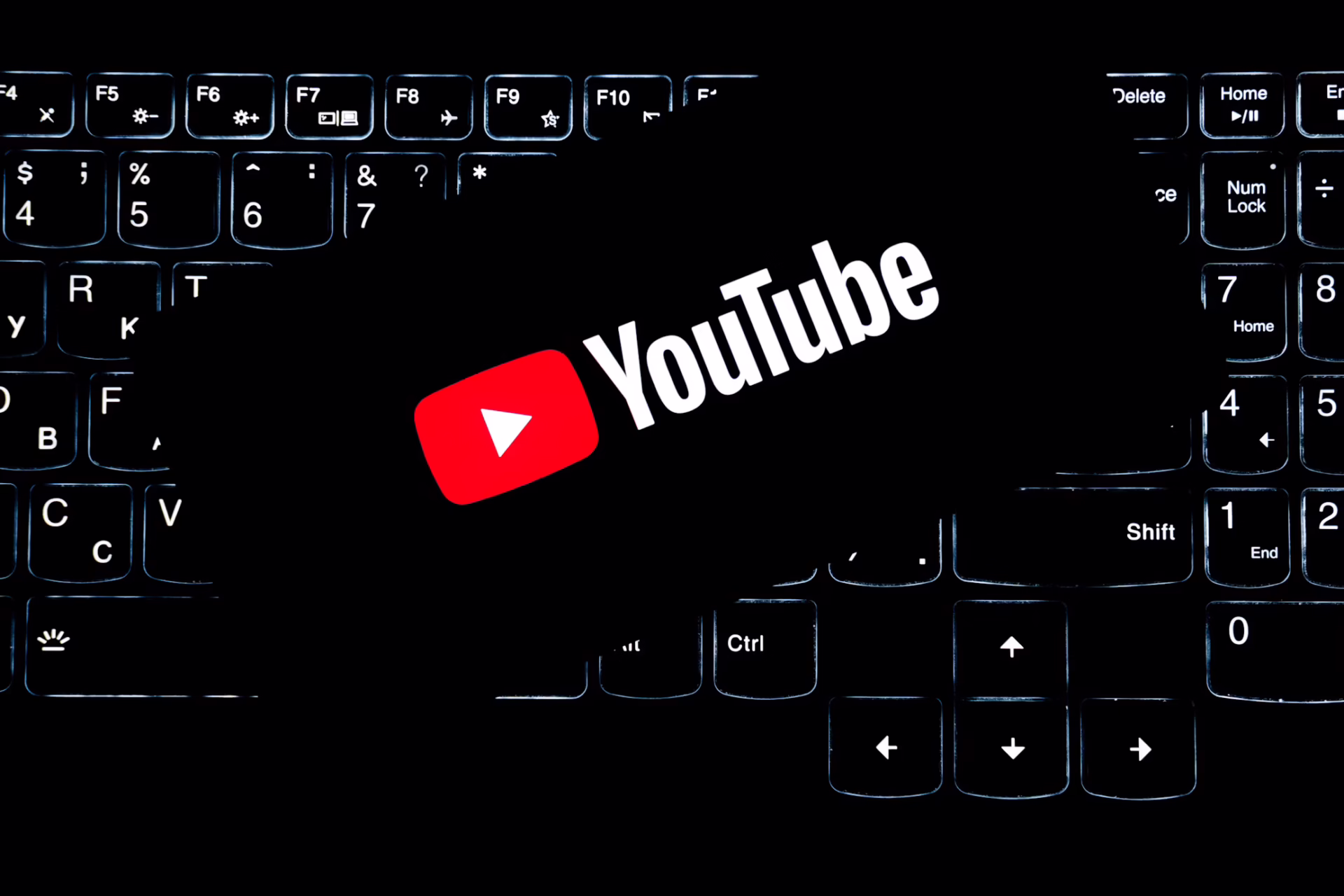 YouTube logo on backlit keyboard