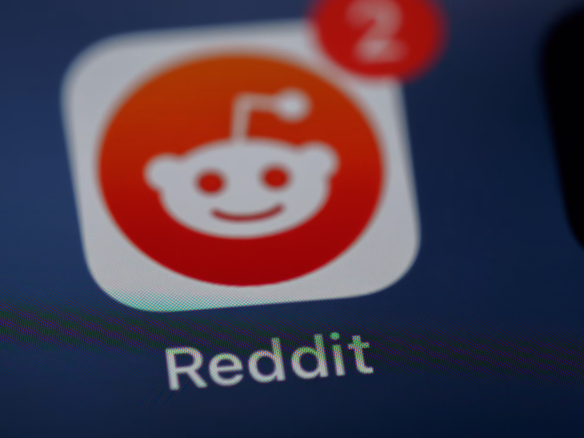 Reddit smartphone icon with two notification alerts